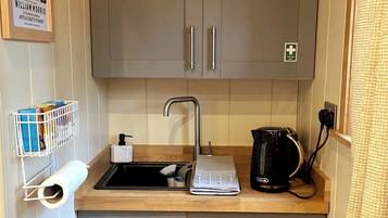 Fridge, toaster, cookware/dishes/utensils