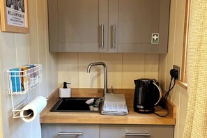 Fridge, toaster, cookware/dishes/utensils