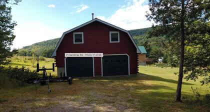Charming 2-bedroom apartment above garage in Island Falls.