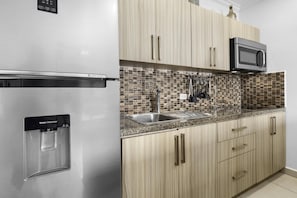 Create your favorite dishes in a modern kitchen with all the tools, appliances, and space you need for easy, enjoyable cooking.