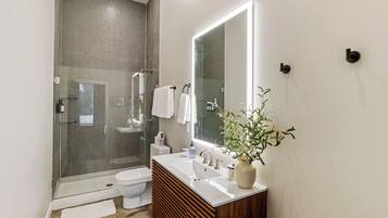 Hair dryer, towels, soap, shampoo