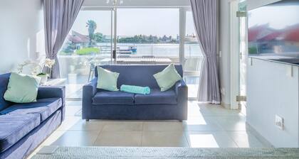 Luxury Riverside Getaway | Balcony | Pool