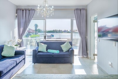 Luxury Riverside Getaway | Balcony | Pool