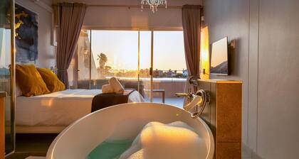 Luxury Riverside Getaway | Balcony | Pool