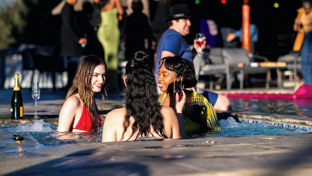 A pool area with people relaxing and socializing. - Mawo Luxury Boutique (Johannesburg)