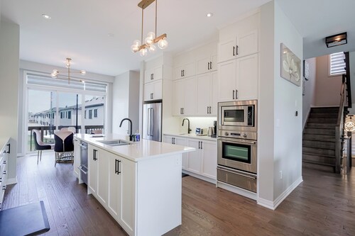 Skyline Serenity 4000+ SqFt of Luxury with Rooftop Terrace | Elevator &Lake View