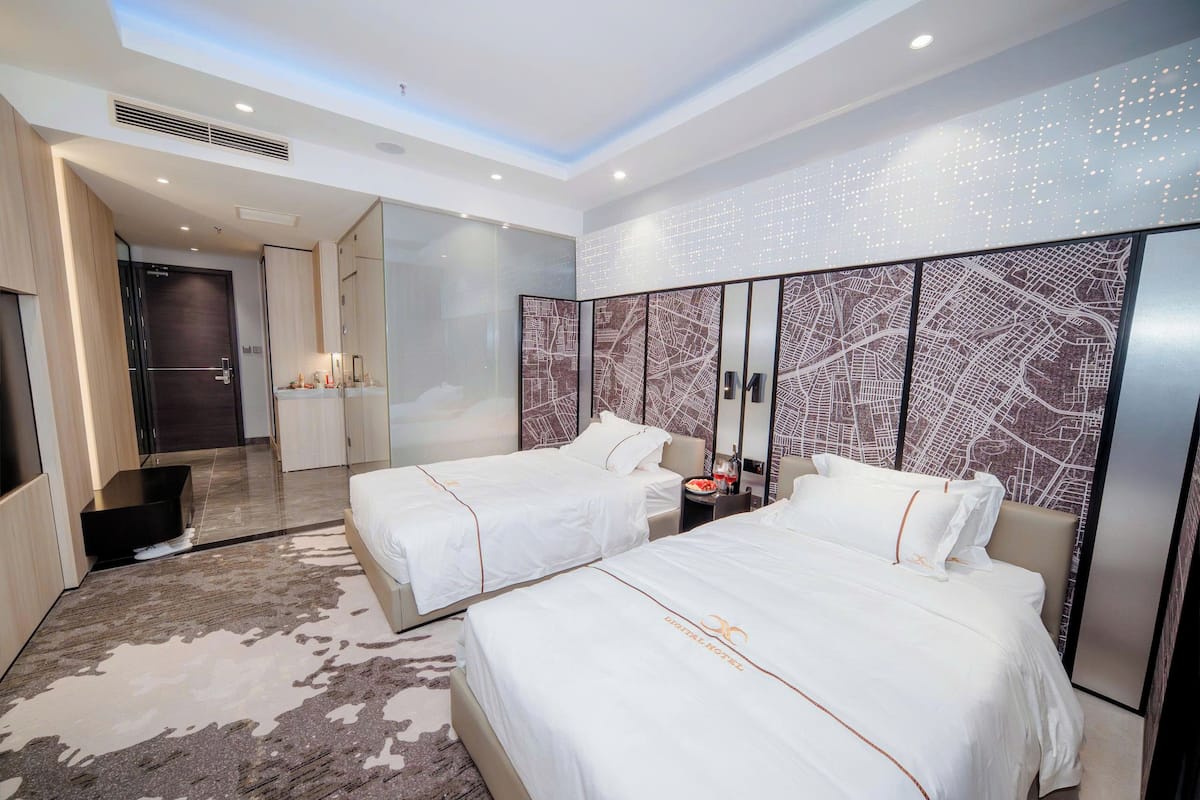 Deluxe kamer, 1 twee- of 2 eenpersoonsbedden | Lakens van Egyptisch katoen, luxe beddengoed, donsdekens