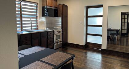 Modern stone cottage just one minute from I-40 exit 321 in Muldrow, Oklahoma.