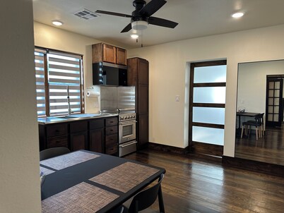 Modern stone cottage just one minute from I-40 exit 321 in Muldrow, Oklahoma.