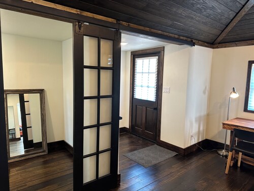 Modern stone cottage just one minute from I-40 exit 321 in Muldrow, Oklahoma.