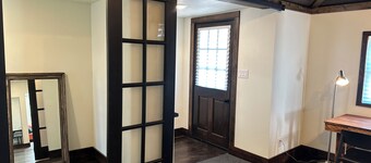 Modern stone cottage just one minute from I-40 exit 321 in Muldrow, Oklahoma.