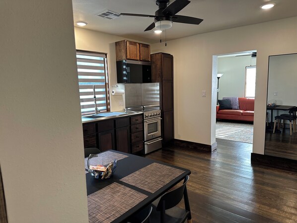 Microwave, oven, stovetop - Modern stone cottage just one minute from I-40 exit 321 in Muldrow, Oklahoma. (Muldrow)