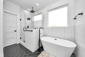 Jetted tub, hair dryer, towels, soap