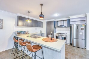 Casa de ciudad Deluxe, vista al jardín | Cocina privada