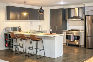 Casa de ciudad Deluxe, vista al jardín | Cocina privada
