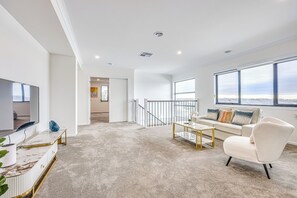 Casa de ciudad Deluxe, vista al jardín | Área de sala de estar