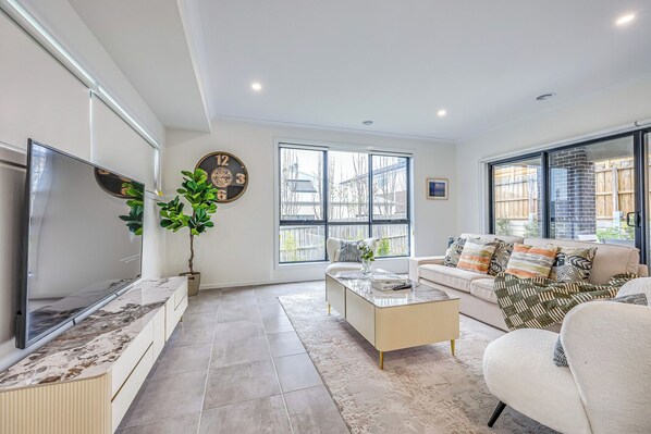 Casa de ciudad Deluxe, vista al jardín | Área de sala de estar