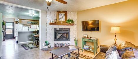 TV, fireplace, books