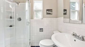 Shower, hair dryer, towels, soap