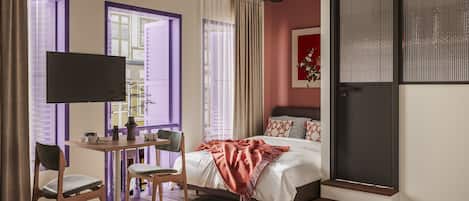 Desk, laptop workspace, free WiFi, bed sheets