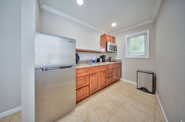 Fridge, microwave, stovetop, coffee/tea maker