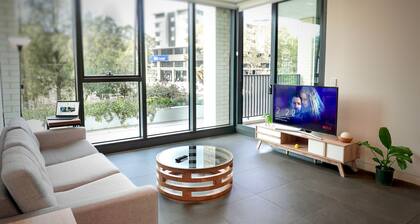 Olympic Park Stylish 2BR | Walk to stadium | Pool & Gym