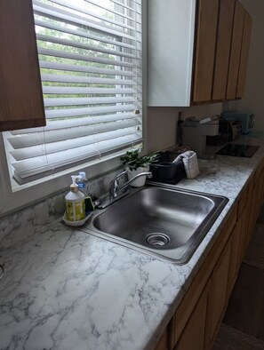 Fridge, stovetop, coffee/tea maker, toaster