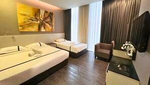 A hotel room with two beds, a desk, a chair, a painting, and a large window with curtains. - Seeds Hotel Premier One City Subang (Subang Jaya)