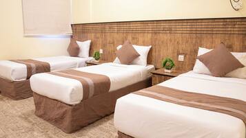 Minibar, setrika/meja setrika, Wi-Fi gratis, dan seprai linen