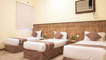 Triple Room | Minibar, iron/ironing board, free WiFi, bed sheets