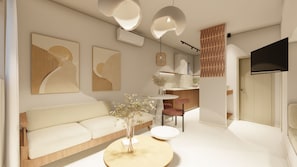 One Bedroom Suite with Sea View | Living area | Flat-screen TV