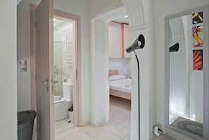 Hair dryer, towels, soap, toilet paper