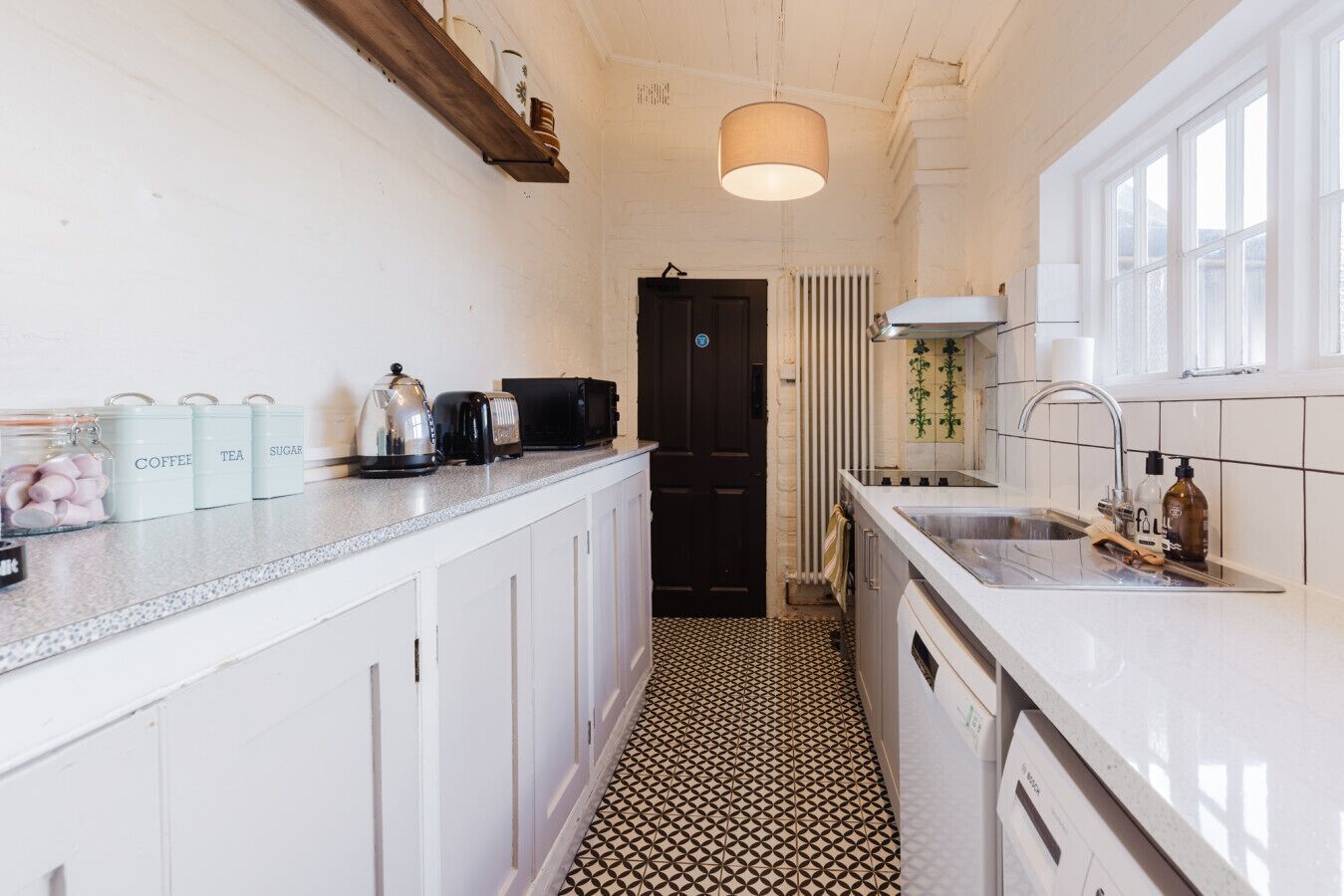 Microwave, stovetop, dishwasher, coffee/tea maker