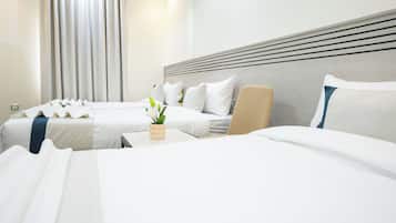 Triple Room | Minibar, blackout curtains, soundproofing, iron/ironing board