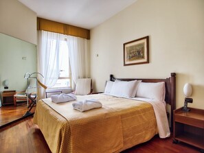 Bilocale con vista giardino | Safe på rommet, strykejern/-brett og wi-fi (inkludert)