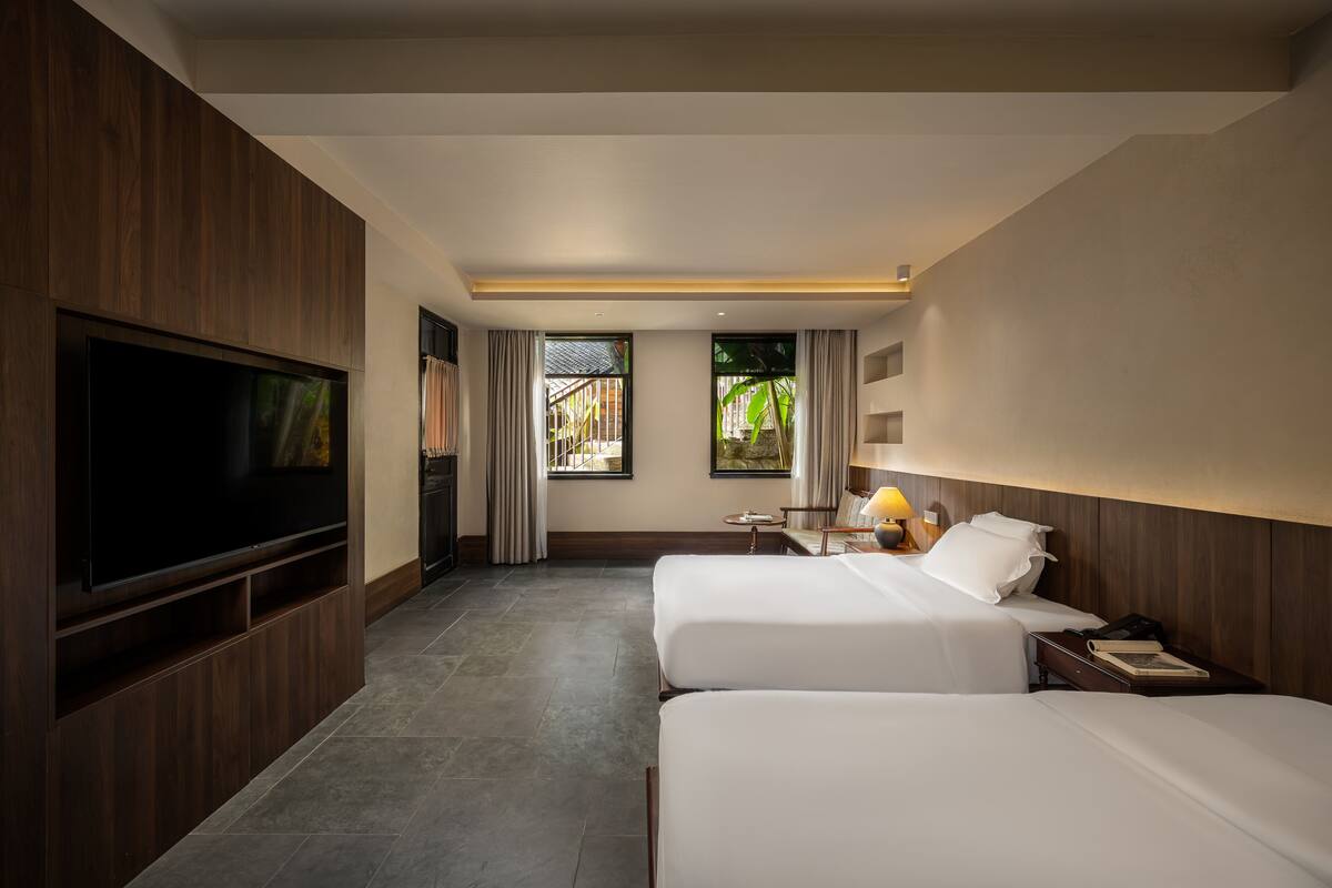 Basic Twin Room, Courtyard View | Blackout drapes, iron/ironing board, free WiFi