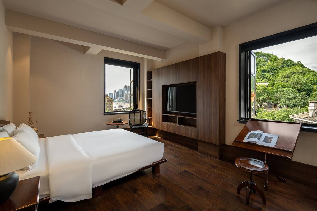 Economy Double Room, Patio, River View | Blackout drapes, iron/ironing board, free WiFi