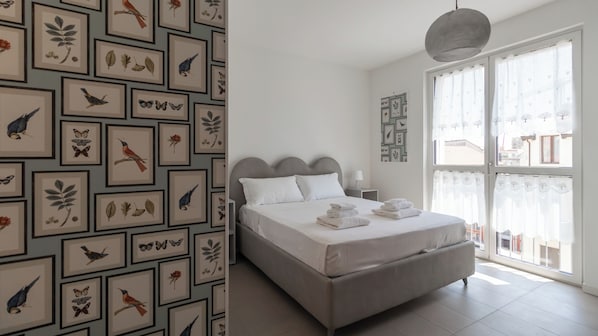 Apartament (1 Bedroom) | 1 dormitori, planxa i posts de planxar, bressols i roba de llit