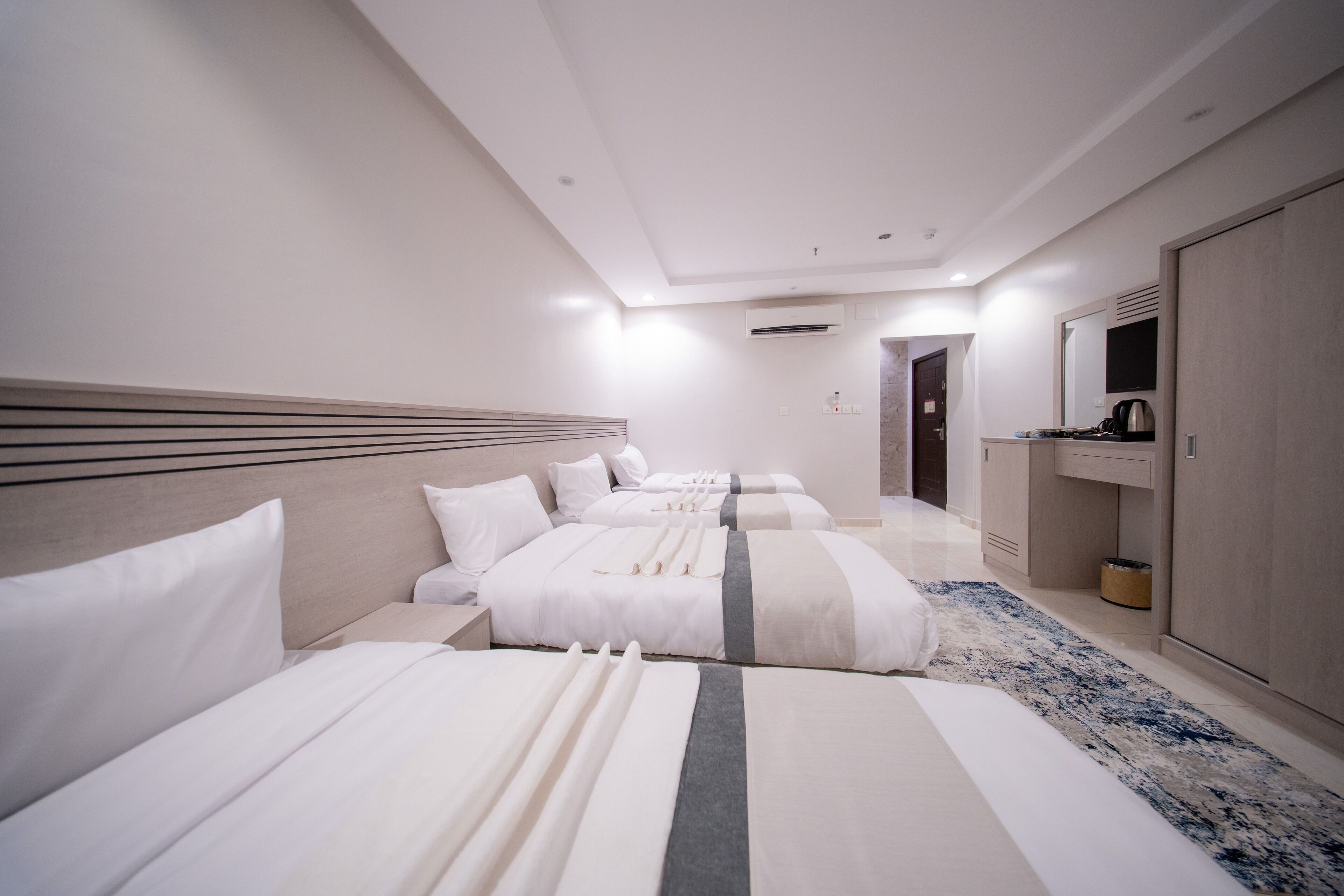 Quadruple room | Minibar, iron/ironing board, free WiFi, bed sheets