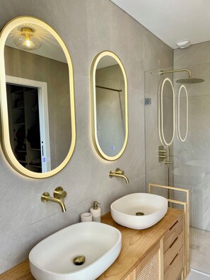 Shower, hair dryer, towels, toilet paper