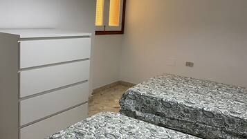 2 habitaciones, tabla de planchar con plancha, wifi y ropa de cama