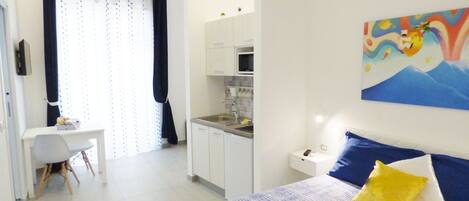 2 habitaciones, tabla de planchar con plancha, wifi y ropa de cama