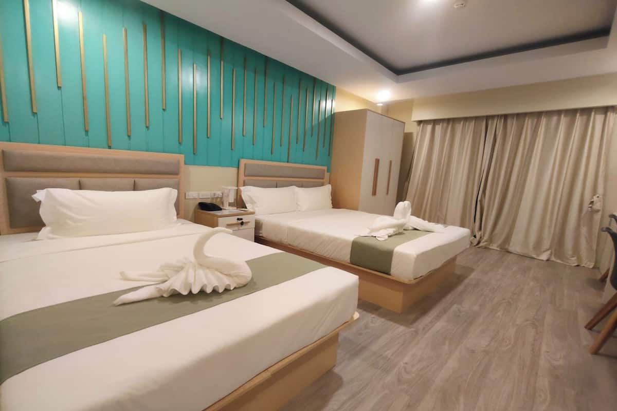 Family Room | Minibar, desk, blackout curtains, iron/ironing board