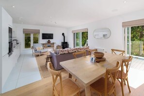 TV, fireplace, offices - Overwater Penthouse – 3-Bed River View Penthouse Apartment at Tors Park (Lynmouth)