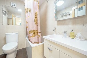 Hair dryer, towels, soap, toilet paper