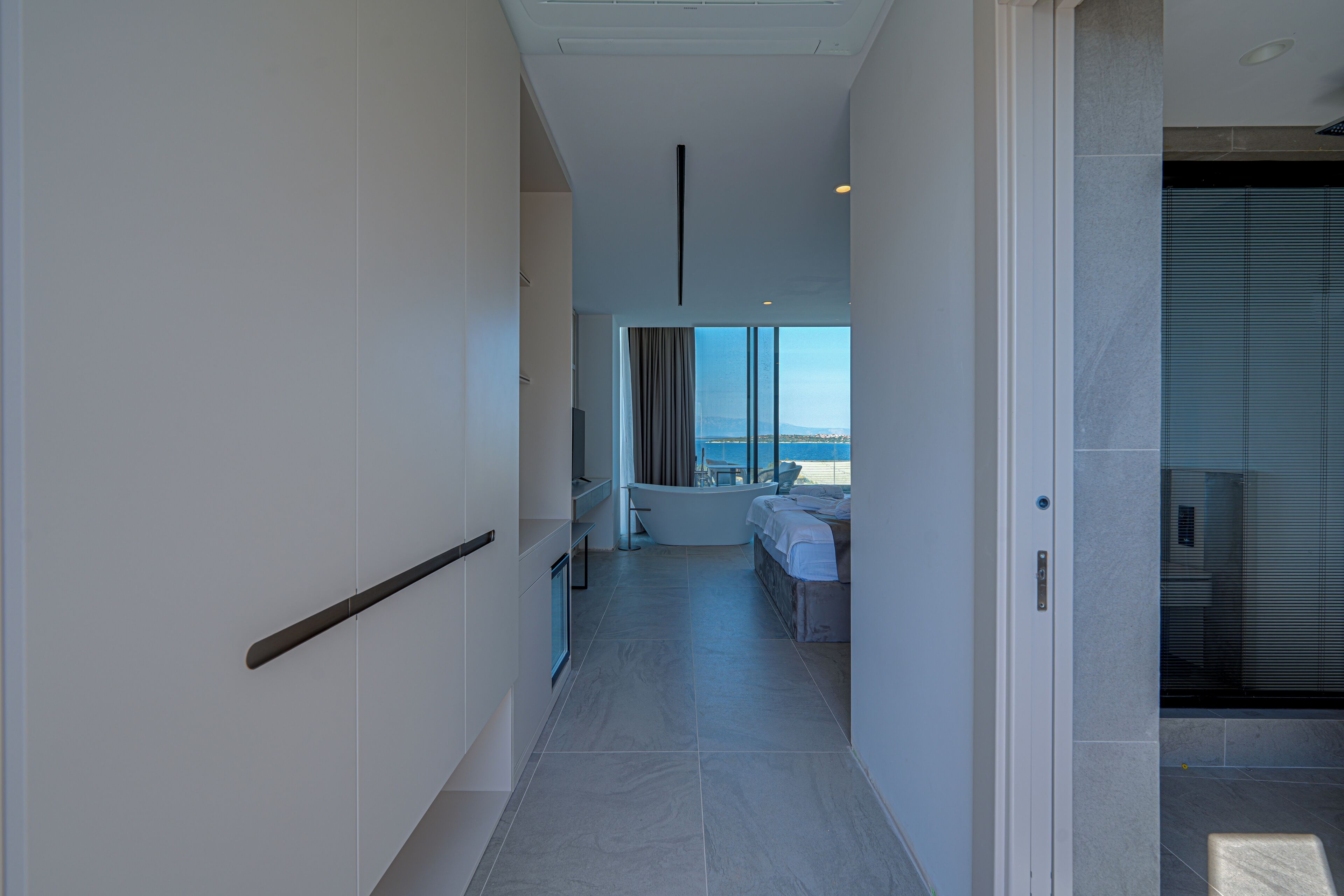 Luxury Studio Suite, 1 King Bed, Private Bathroom, Sea View | Desk, laptop workspace, free WiFi, wheelchair access