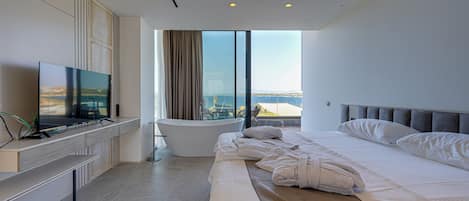 Luxury Studio Suite, 1 King Bed, Private Bathroom, Sea View | Desk, laptop workspace, free WiFi, wheelchair access