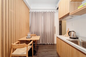 Chambre | Cuisine privée | Réfrigérateur, serviettes en papier