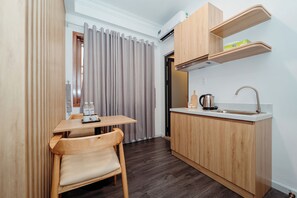 Chambre | Cuisine privée | Réfrigérateur, serviettes en papier