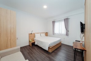 基本客房 | 羽絨被、客房內保險箱、書桌、筆電工作空間